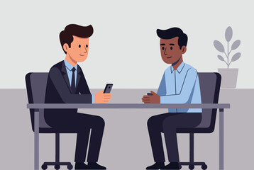 Obraz premium Business meeting or job interview between two professional men sitting at a conference table in an office.