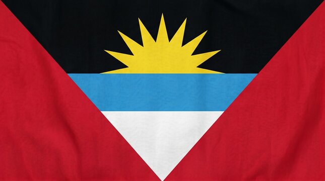 Antigua and Barbuda flag with sun rising, tricolor V‑shape, symbolizing hope and unity.