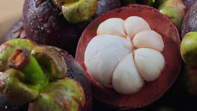 Fresh mangosteen on a wooden floor.