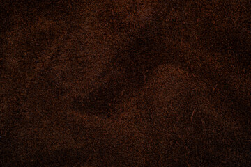 Close up view of dark brown textured material surface © reddish
