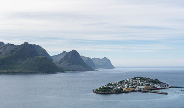 Scenic view of remote Husoy island fishing community in arctic Norway