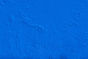 Fototapeta premium Deep blue textured background with rough surface