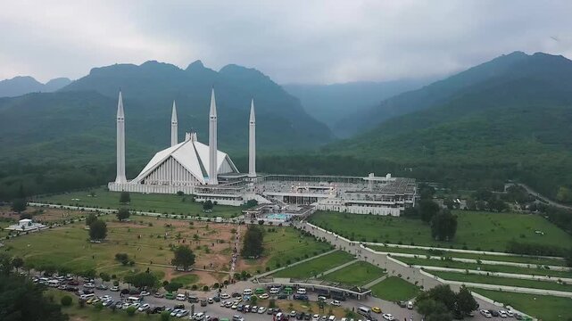 Panoramic Aerial View of Faisal Mosque Islamabad with Mountains and Urban Background