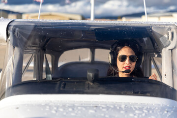 Pilot inside small aircraft cockpit. © Rawpixel.com