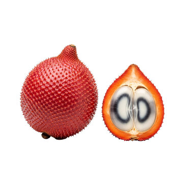 Gac fruit whole and cross section red spiky tropical produce.