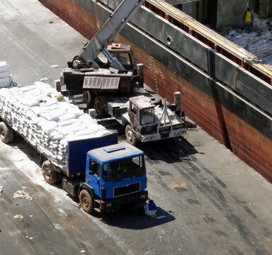  discharging flour from a ship in banjul harbour in gambia