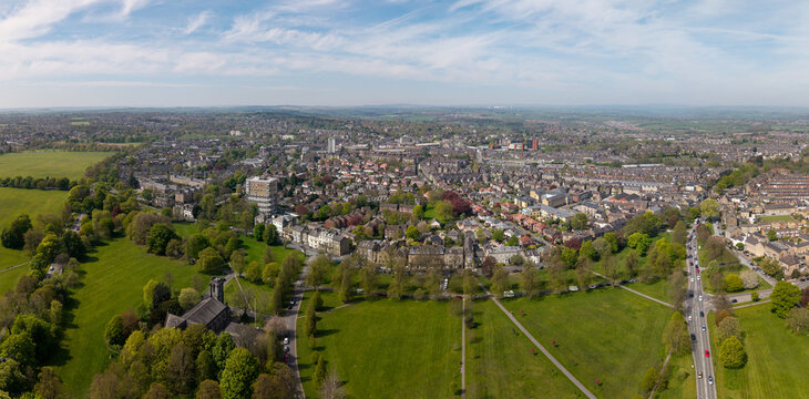 Aerial view of Harrogate Town centre surrounded by The Stray public park in Summer