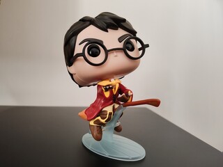 Obraz premium Rome, Italy - April 6, 2026, detail of the Harry Potter statuette, protagonist of the eponymous fantasy novel series written by J.K. Rowling.