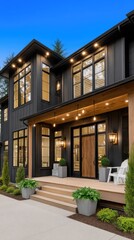 Fototapeta premium Detailed view of a welcoming house exterior at twilight featuring blue siding and wooden door with porch lights shining
