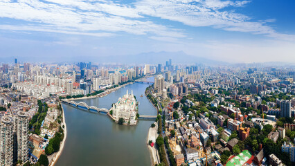Fototapeta premium Aerial View of Urban City with River and Central Island Building