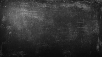 Chalk rubbed out on blackboard background. Grunge dark blackboard texture. © Sharmin
