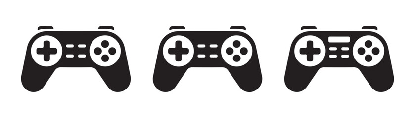 Three modern game controllers for playing video games shown as professional black vector design icons. © MSTGIRATUN