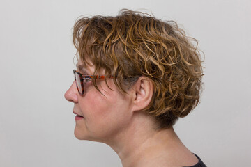 Side view profile portrait of mature woman for reference dataset. © Caribbean Blue