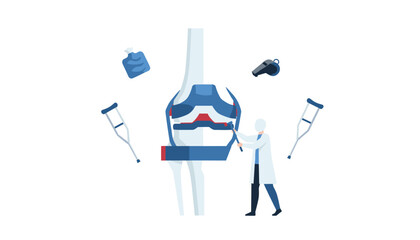 Fototapeta premium Orthopedic doctor examining a large anatomical knee joint model surrounded by crutches, ice pack, and whistle.