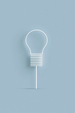 Light bulb design on gray background in minimal style with simple lines and shapes
