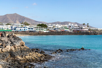 Fototapeta premium The seaside town of Playa Blanca on the southern tip of the Canary Island of Lanzarote, Spain