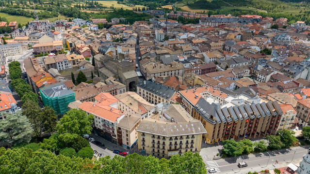 Aerial panoramic view of a scenic mountain town and valley, Jaca - Spain