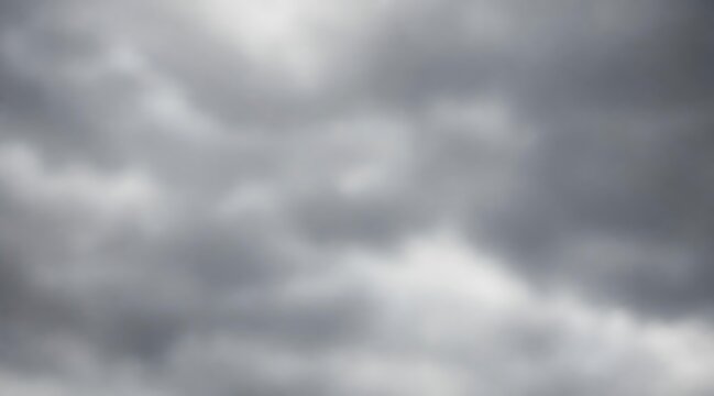 Blurred dark storm clouds in the sky as a dramatic weather background