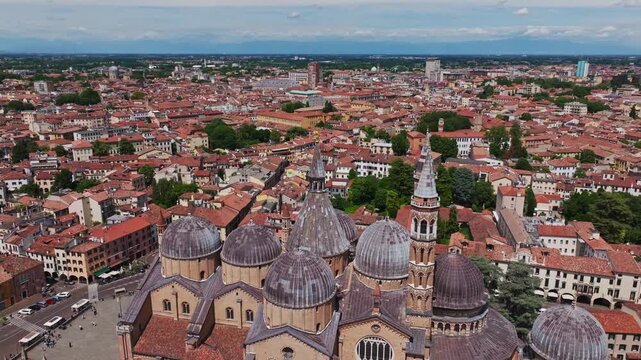 Aerial drone view of the Basilica of St. Anthony in Padua, Italy, showcasing the iconic domes, historic architecture, and surrounding cityscape of the Veneto region.