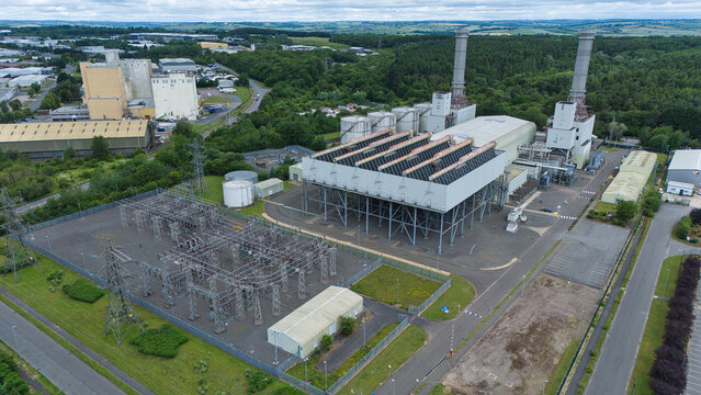 Close up aerial view of a massive air-cooled condenser ACC installation at a large-scale power station in Corby, Northamptonshire, UK.