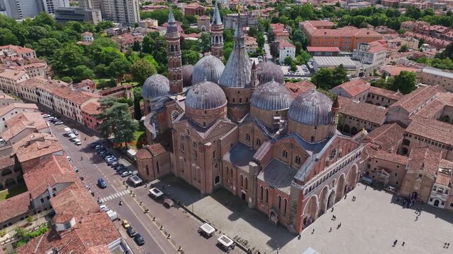 Aerial drone view of the Basilica of St. Anthony in Padua, Italy, showcasing the iconic domes, historic architecture, and surrounding cityscape of the Veneto region.