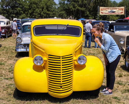 antique truck with a young woman