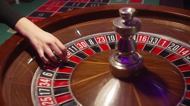 Woman Placing Chip On Roulette Number, Strategic Bet Before Spin