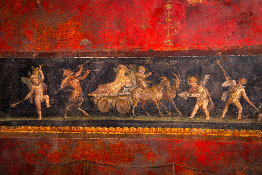 Ancient Roman fresco wall paintings of Dionysian frieze with winged cupids from Pompeii, Campania, Italy, Europe