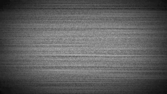 Retro static glitch overlay with no signal noise and distorted analog video screen texture. Monochrome static pattern with horizontal lines and disrupted texture for digital motion graphics use.