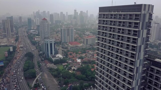 Wide aerial drone shot of rush hour in Jakarta.