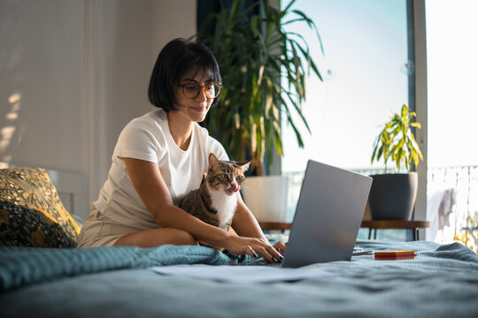 Woman working with pet