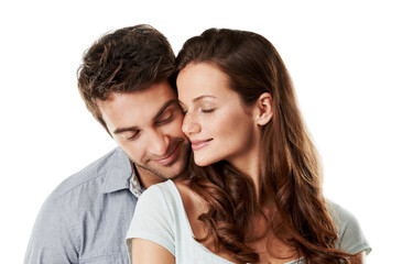 Obraz premium Love, smile and hug with couple in studio for connection, support and bonding together. Marriage commitment, romance and loyalty with man and woman on white background for care, embrace and partner