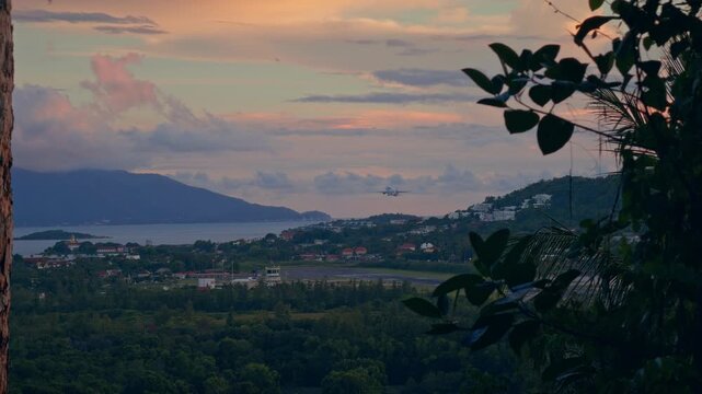 Airplane Taking Off From Koh Samui Airport at Sunrise With Tropical Landscape and Coastal Mountains in the Background. Travel, Aviation and Tourism