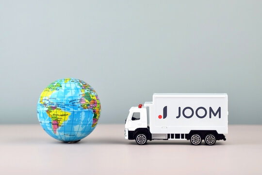 The truck with the emblem JOOM. Trade tariffs and competition.