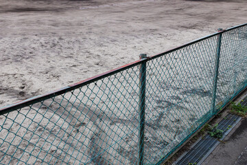 Fototapeta premium Chain link fence surrounding baseball field