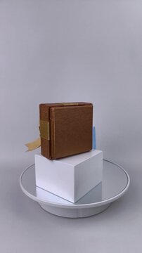 Vertical 4K Premium Ribbon Bronze and Blue Gift Box Showcase Clockwise