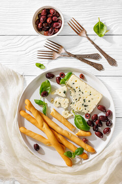 Gourmet blue cheese and breadsticks with olives