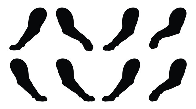 Eight black foot silhouettes in different positions Vector