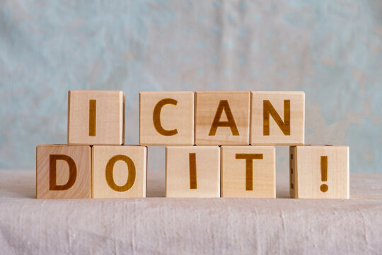 i can do it !, motivational phrase made of letters on wooden cubes