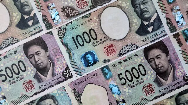 Japan, Japanese yen paper banknotes, money for business, financial transactions, and settlements. Japanese yen as a financial background for your design