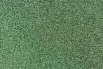Fototapeta premium Green textile fabric texture background with fine woven surface