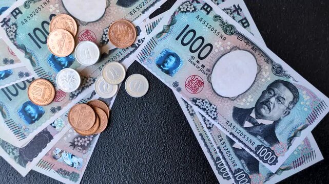 Japan, Japanese yen paper banknotes, money for business, financial transactions, and settlements. Japanese yen as a financial background for your design