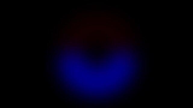 Defocused red and blue emergency strobe lights flashing on a dark background. Police, fire truck, and ambulance sirens glow with smooth bokeh. Emergency light overlay creates urgent warning