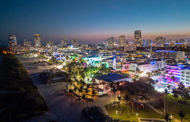 Fototapeta premium Miami night coastline from drone. Miami ocean shore at night. Miami shoreline. Panoramic Miami evening coastline.