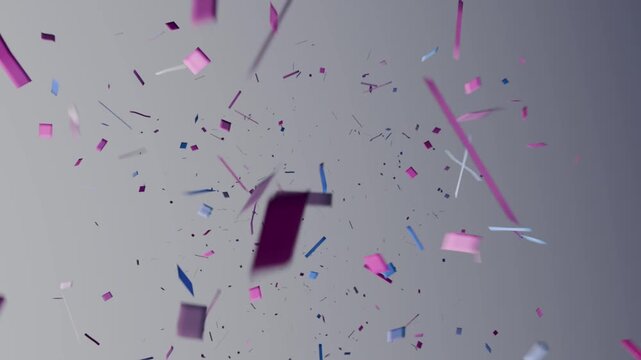 Bursting confetti cluster expanding and tumbling across gray backdrop, with strips, squares