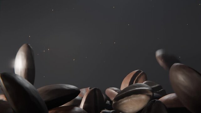 Hopping roasted coffee beans colliding, sending others into tumbling motion across studio backdrop