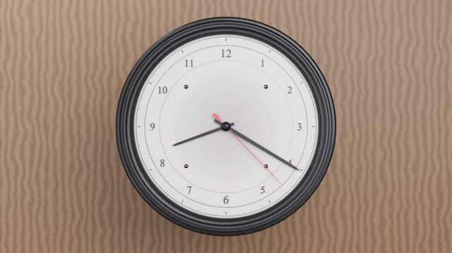 Recording, round clock moving red second, black minute-hour hands, indicating time on beige wall