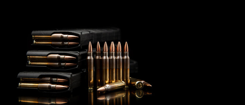 Rifle ammunition and loaded magazines backdrop