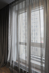 Obraz premium Window with sheer curtains and view