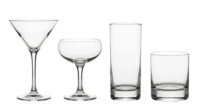 Set of four different empty glass cups for cocktails and drinks isolated on transparent background